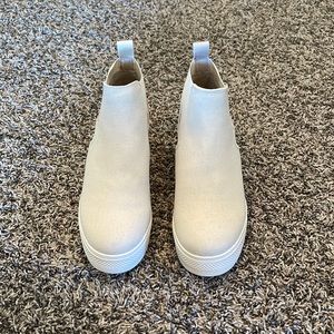 Women’s slip on booties by Dolce Vita.